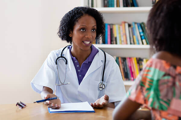 African american doctor recommending patient