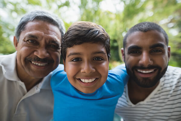 Image of multi generation family smiling